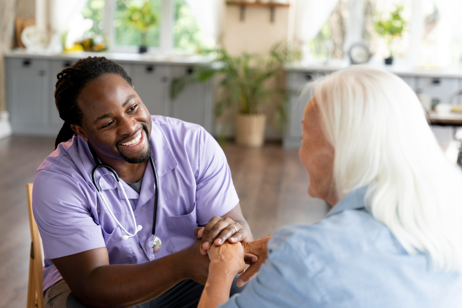 Caregiver with senior woman during a home care visit
